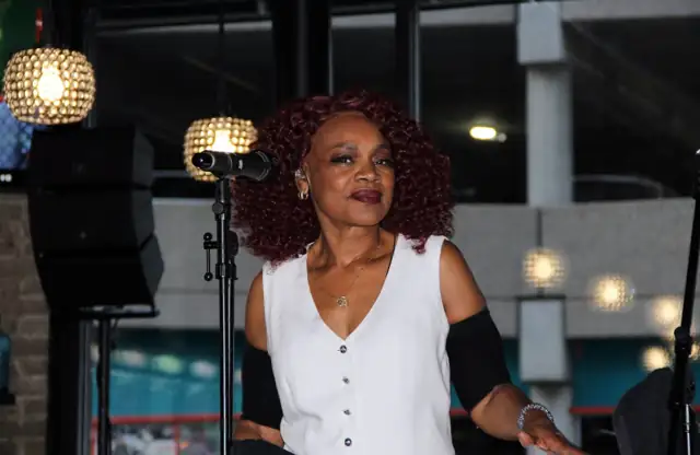 Linda Brooks performing with The Real Deal