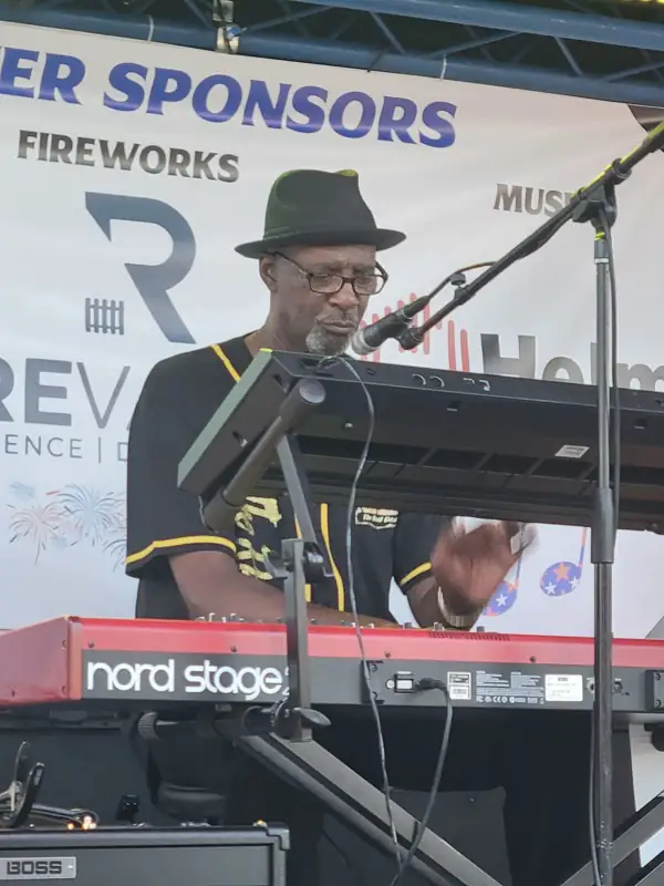 Norman Bryant performing with The Real Deal